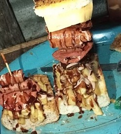 R100 [Halal] - Chips, Lettuce, Cucumber, Polony [x2], Vienna [x2], Russian [x2], Burger Patty, Cheese [x2], Egg & 1.25L Coldrink